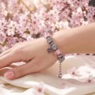 Elegant Silver Charm Bracelet on wrist
