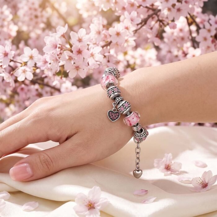 Elegant Silver Charm Bracelet on wrist Elegant Silver Charm Bracelet on wrist